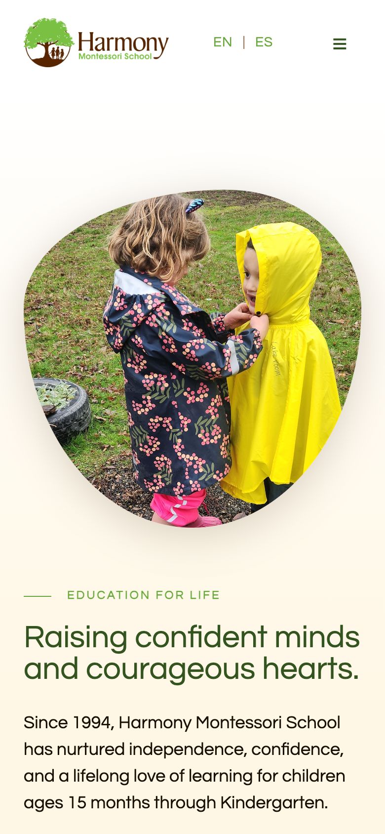 Harmony Montessori School website on a phone
